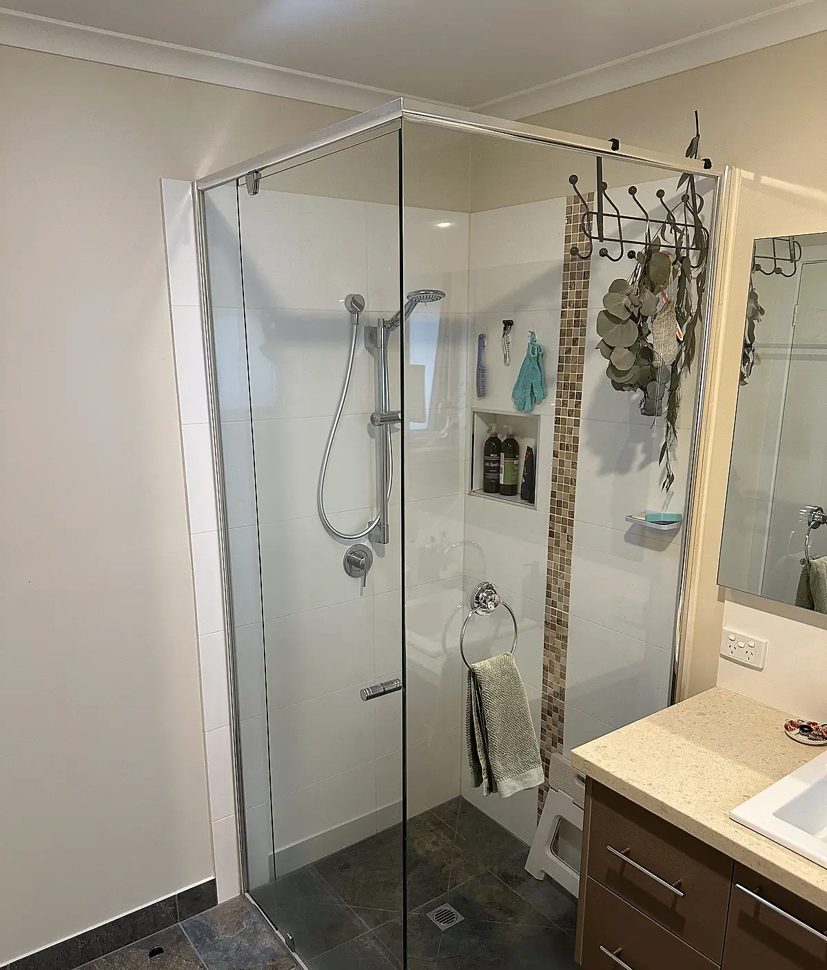 Full-height frameless shower screen after cleaning